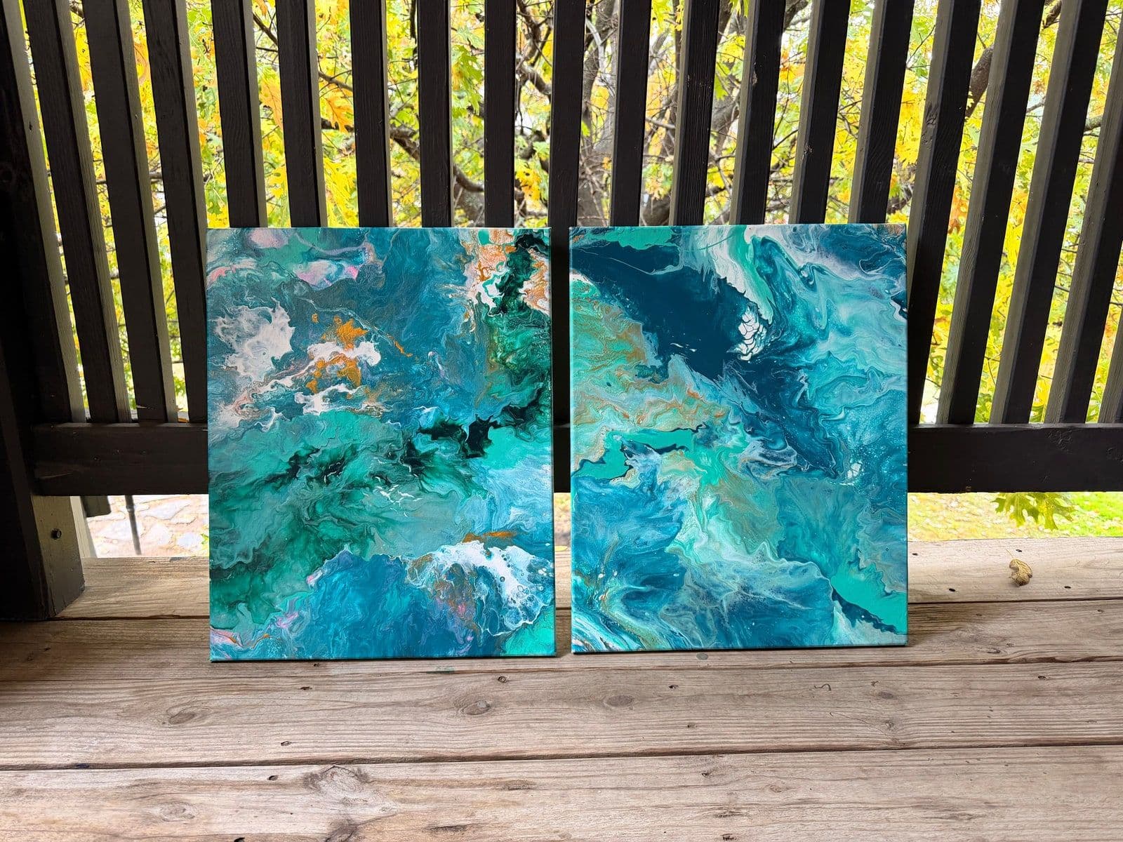 An abstract diptych in blue and white, photographed outdoors.