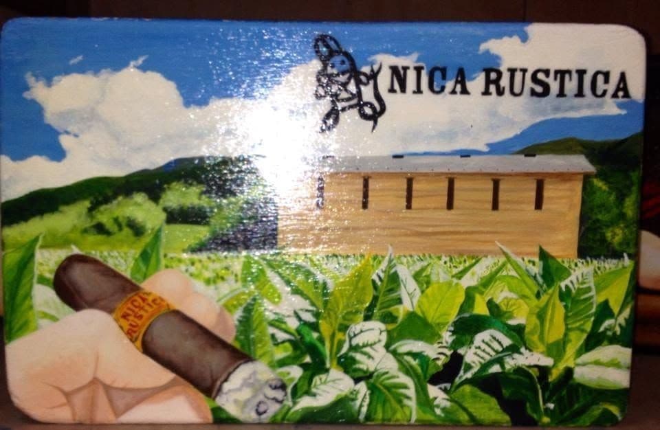 Early hand-painted work created for the tobacco industry.
