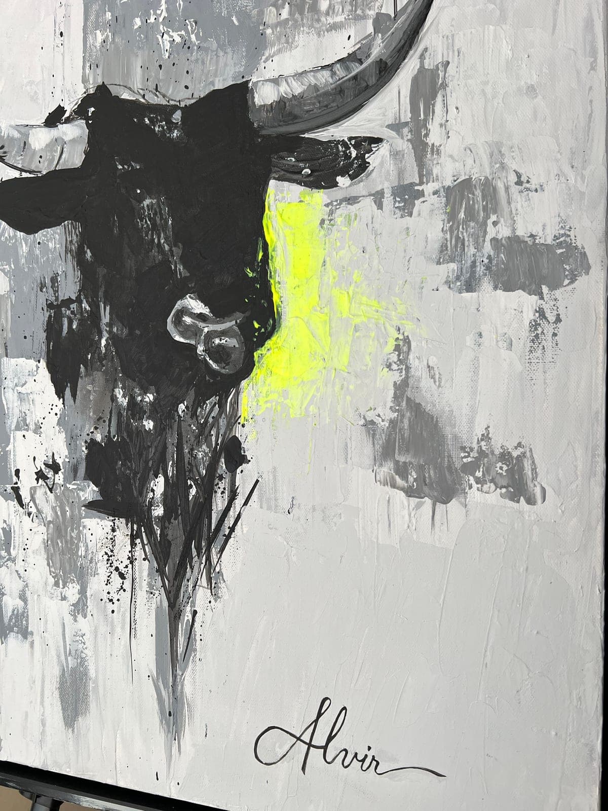 Close detail of the signature and the fluorescent mark on Bull 001.