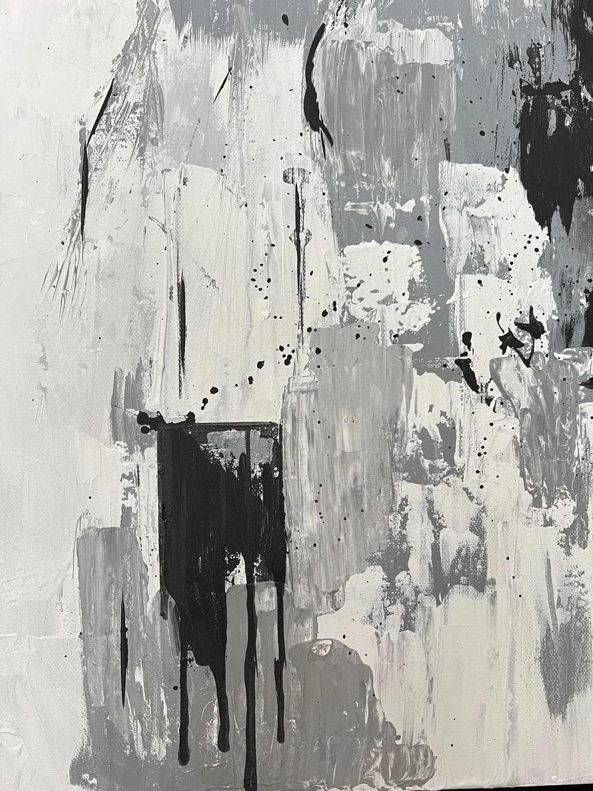 The grey and white ground alone, with the small black block and its drips